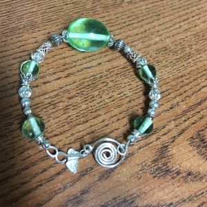 Handcrafted 7” bangle bracelet with green glass b
